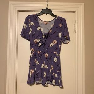 Purple floral romper with bow front tie